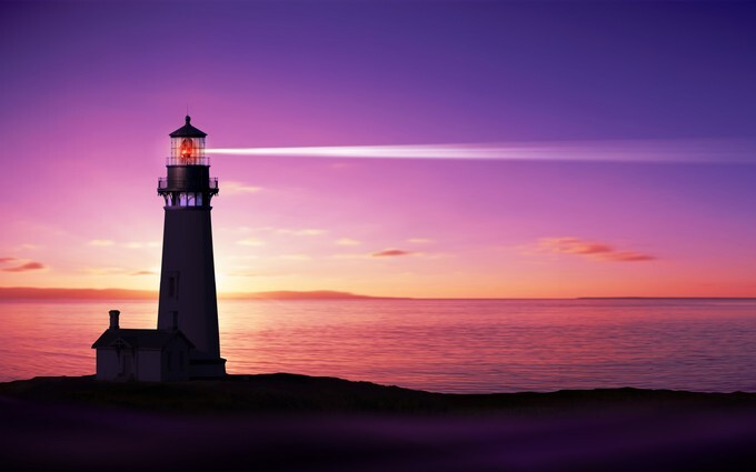 Lighthouse searchlight beam over sunset effect